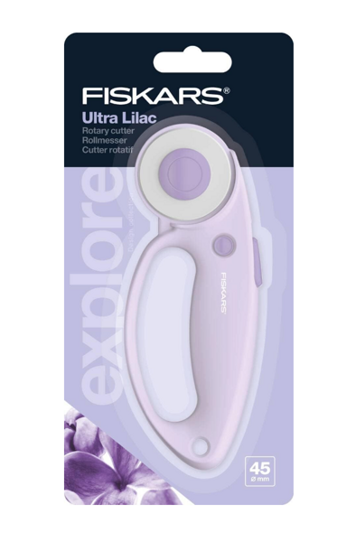 fialový kruhový řezač na látku Fiskars