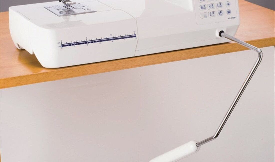 Čo je kolenná páka pre šijací stroj?