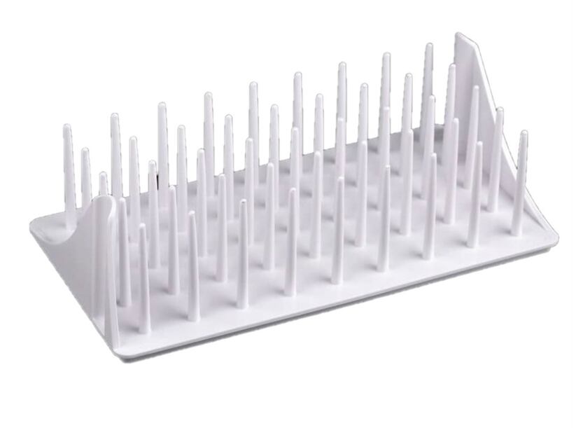 Stojan na cievky nití